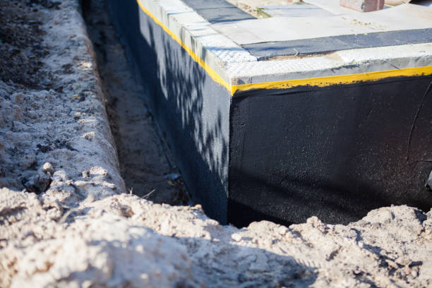 Professional Basement Waterproofing technician working in Shakopee, MN